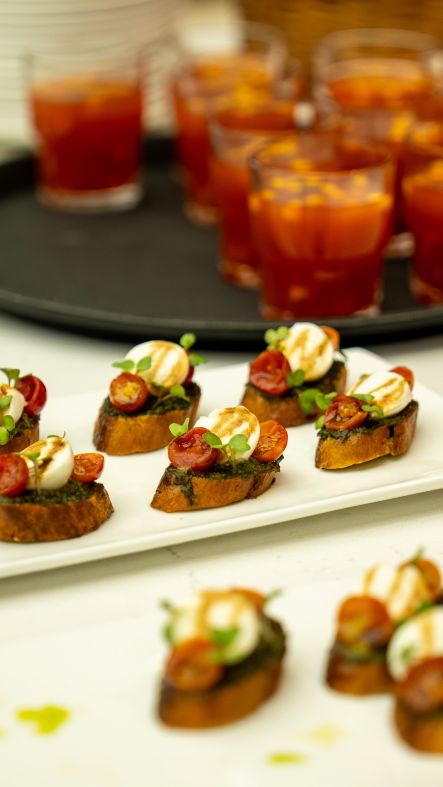 Tomato and mozzarella crostini with chilled gazpacho shots at Miles Ahead Delhi