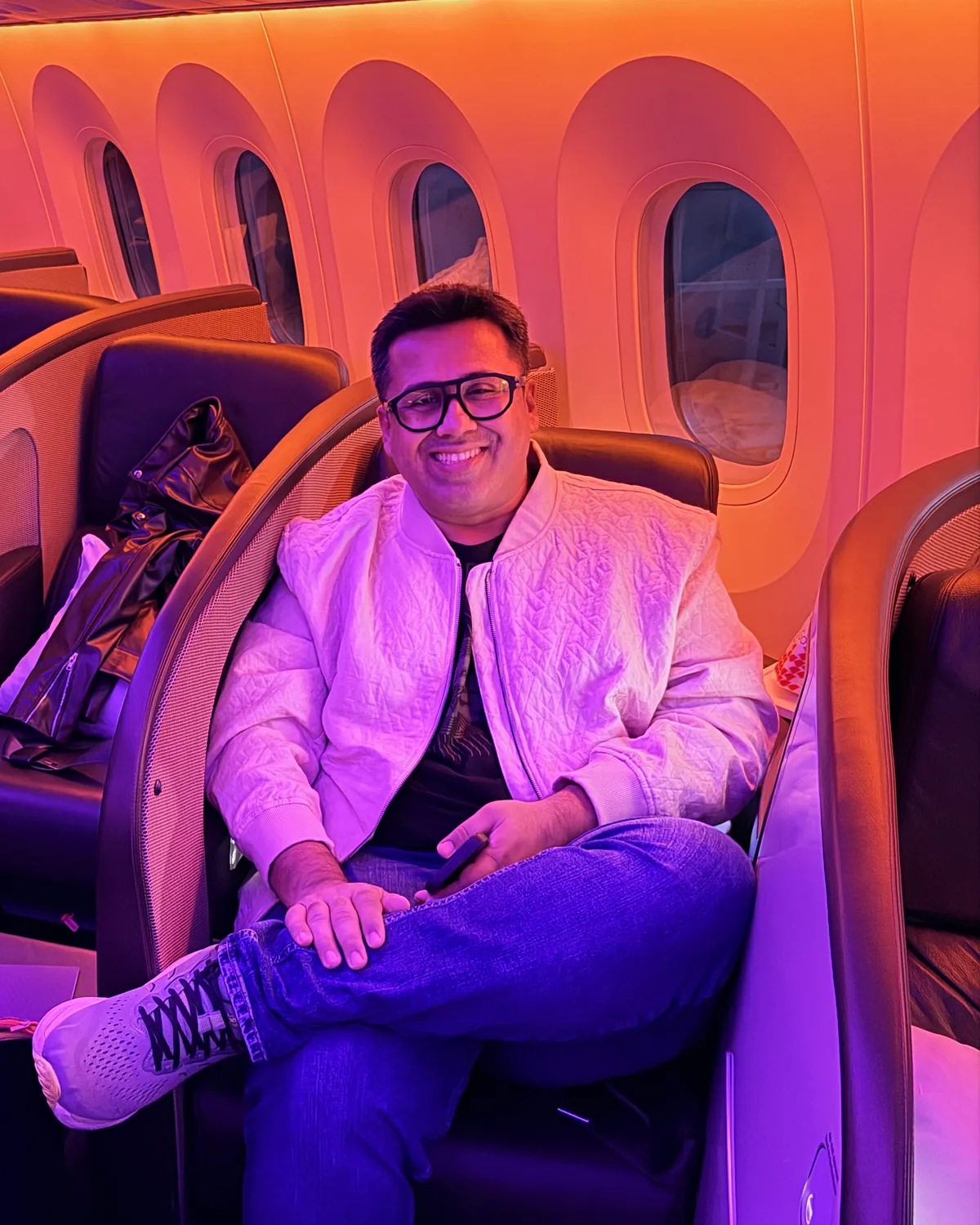 Aadil in a Virgin Atlantic Upper Class suite on the Boeing 787
